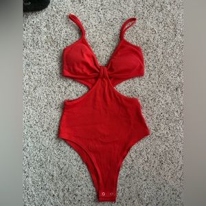 orange/red cut out bodysuit
